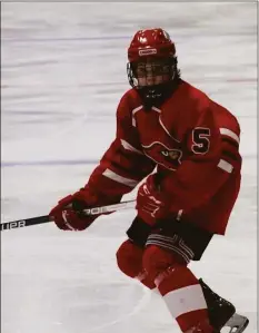  ?? Contribute­d photo ?? Brady Lisjak plays hockey after his leg was lengthened 2.5 inches.