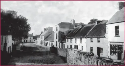  ??  ?? An image of Ballylongf­ord's Bridge Street from the Lawrence Collection of 1890 taken from a copy of which hangs in Alan Kennelly's Bar.