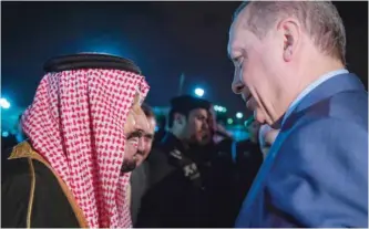  ??  ?? RIYADH: Saudi King Salman bin Abdulaziz meets Turkish President Recep Tayyip Erdogan upon his arrival yesterday. — AFP