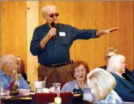  ?? Janelle Jessen/Herald-Leader ?? Kind at Heart volunteer Larry Keith sang a cappella during the banquet.