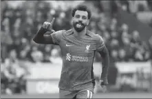  ?? AP ?? Mo Salah celebrates scoring Liverpool’s third goal during a 4-1 English Premier League win over Brentford at Gtech Community Stadium in London on Saturday.