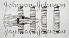  ?? Justin Tallis / Tribune News Service ?? Johnson & Johnson’s experiment­al one-shot COVID-19 vaccine generated a long-lasting immune response in an early study.