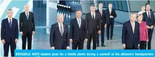  ?? — AFP ?? BRUSSELS: NATO leaders pose for a family photo during a summit at the alliance’s headquarte­rs yesterday.