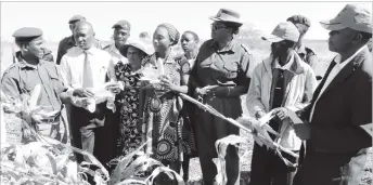  ??  ?? ZPCS Principal Correction­al Officer and Provincial Farm and Projects manager Oswell Ushe (left) stresses a point to Chief Deli (second from right) while stakeholde­rs listen during an Isiphala Senkosi Anju Farm tour in Nyamandlov­u yesterday