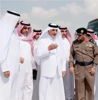  ?? Makkah Gov. Prince Khaled Al-Faisal tours an area hit by the recent rains in Al-Leith region on Tuesday. ??