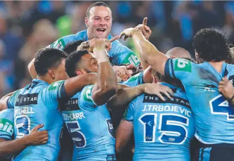  ?? Picture: Getty Images ?? CAPTAIN’S CALL: Boyd Cordner celebrates with Blues teammates in last year’s State of Origin series.