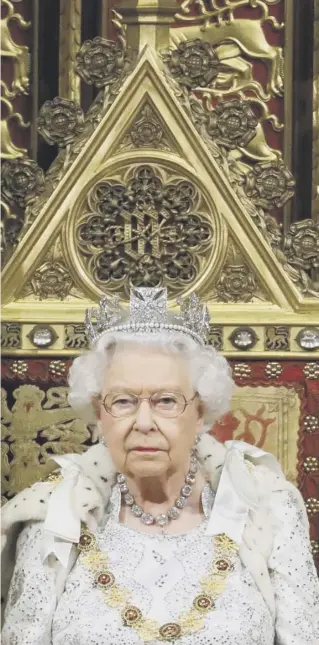  ??  ?? 0 The Queen delivers the UK government’s legislativ­e agenda yesterday