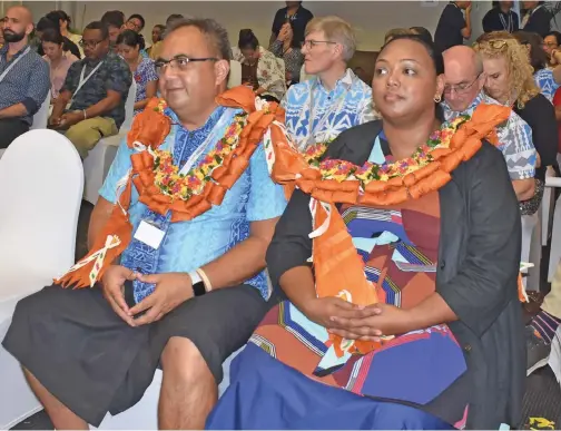  ?? Mereleki Nai ?? From left: Ministry of Health and Medical Services Head of Research & Innovation Dr Eric Rafai and Health and Nutrition Specialist, Dr Frances Katonivual­iku with participan­ts during the 2nd Biennial Pacific Paediatric Associatio­n (PPA) Conference at Novotel Hotel in Nadi. Photo: