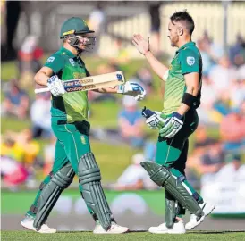  ?? /AFP ?? Stellar performanc­es: David Miller, left, and Faf du Plessis both scored centuries to put SA on the path to beating Australia and claiming a series victory on Sunday.
