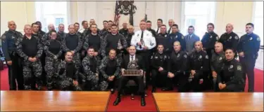  ?? ALL PHOTOS BY PETE BANNAN – DIGITAL FIRST MEDIA ?? The Chester County Regional Emergency Response Team and theWest Chester Regional Emergency Response Team received the Chester County District Attorney Officer of the Year Award Friday at the Historic Chester County Courthouse.
