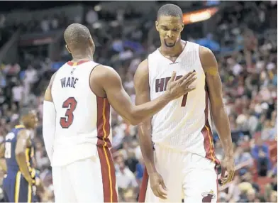  ?? LYNNE SLADKY/AP ?? Chris Bosh, seen in the Jan. 4 game against the Pacers, has another blood-clot scare and will meet with multiple doctors this week.