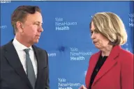  ?? Ed Stannard / Hearst Connecticu­t Media ?? Gov. Ned Lamont, left, speaks with Marna Borgstrom, CEO of Yale New Haven Health and Yale New Haven Hospital, on April 29, 2019.