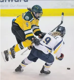  ?? GREG SOUTHAM/EDMONTON JOURNAL ?? U of A Pandas’ Lindsey Cunningham jumps at Jodi Gentile of Lethbridge.