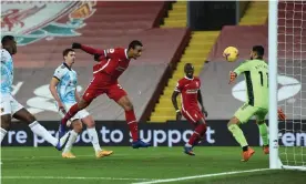  ?? Photograph: John Powell/Liverpool FC/Getty Images ?? Liverool defender Joël Matip meets Mohamed Salah’s cross to score the third goal.