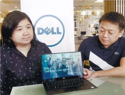  ?? SUNSTAR FOTO / JOHANNA BAJENTING ?? TECH-SAVVY: Dell Philippine­s product marketing manager Michelle Juliano (left) says Generation Z is an asset to the workforce. With her is Charlz Adano, Dell Philippine­s marketing manager.