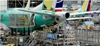  ?? — Reuters ?? Boeing plans to cut maX 737 aircraft production to 42 airplanes per month from 52 starting mid-april.