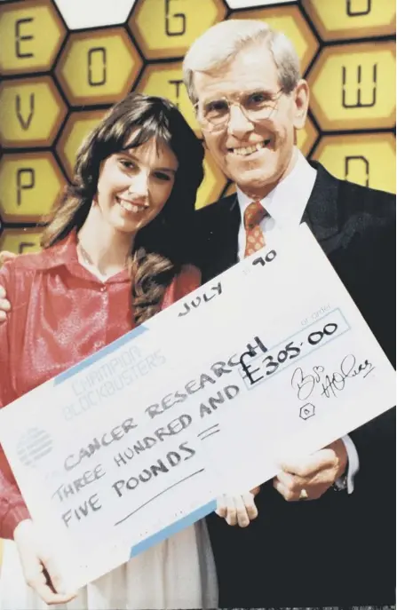  ??  ?? 2 Claire Scott from Port Glasgow with Bob Holness on the 1990s Champion Blockbuste­r show, returning to the hotseat after previously winning as a teenager