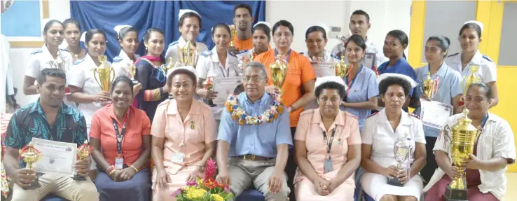  ??  ?? Special Awardees show off their spoils with heads of Department during the Nurses Award Day Celebratio­n at Labasa Hospital yesterday.