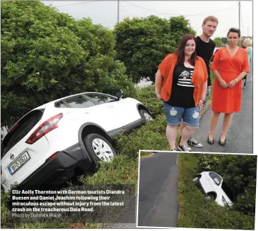  ?? Photo by Domnick Walsh ?? Cllr Aoife Thornton with German tourists Diandra Buesen and Daniel Joachim following their miraculous escape without injury from the latest crash on the treacherou­s Dale Road.