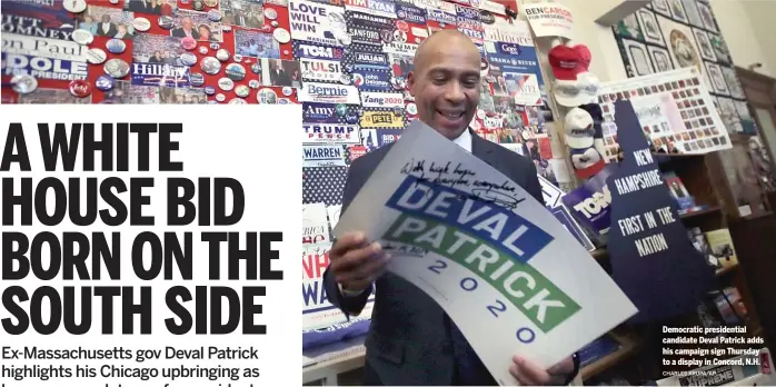  ?? CHARLES KRUPA/AP ?? Democratic presidenti­al candidate Deval Patrick adds his campaign sign Thursday to a display in Concord, N.H.