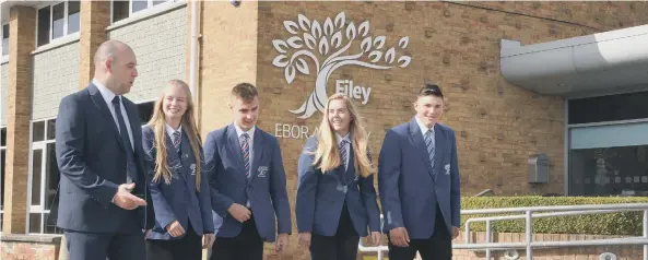  ??  ?? Academy Filey headteache­r Andrew Galbraith with, from left: Katie Pooley, head girl, Nathan East, deputy head boy, Sophie Cowton, deputy head girl, and Ben Colling, head boy.