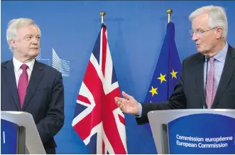  ?? VIRGINIA MAYO/AP ?? EU negotiator Michel Barnier, right, and his British counterpar­t David Davis say they face major challenges to meet the March 2019 deadline for Britain to leave the bloc.