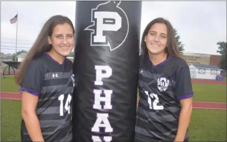  ?? SUBMITTED ?? Phoenixvil­le seniors Maddie White, right, and Lily White, left, have played at the varsity level for the Phantoms’ girls lacrosse and girls soccer teams since they were freshmen.