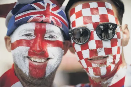 ?? PICTURE: GETTY IMAGES. ?? UNITED NATIONS: An England and a Croatian football fan pose in Red Square ahead of the World Cup semi-final match between England and Croatia.