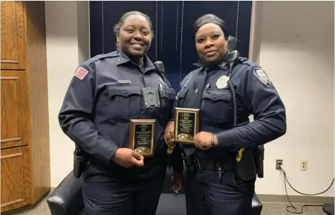  ?? ?? Pine Bluff veteran patrol officers DeAunuana Roberts and Katisha Johnson were recognized as January’s Officers of the Month for their extra efforts. (Special to the Commercial)