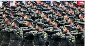  ??  ?? Army’s elite and well trained Special Forces on parade with their Uzi sub machine guns. - Presidenti­al Media