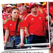 ?? ?? Glum: Wales fans in Doha stadium