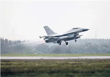  ?? ?? TAKE-OFF: A Danish Air Force F-16. Denmark is making plans for aircraft training.