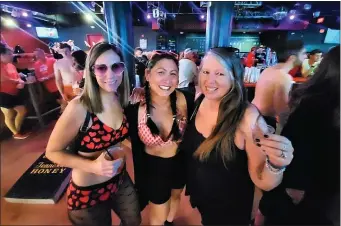  ?? (DANIELLE RAY — SENTINEL & ENTERPRISE ?? Left to right: Sarah Conti of Westminste­r, Fitchburg resident Liz Stone, and Robyn Comeau from Leominster at the Feb. 18 Cupid’s Undie Run in Boston. The women are members of the Twin Cities citizens heavy Cure NF with Jack team, which once again took the top fundraisin­g spot in the country netting over $65,000 for the Children’s Tumor Foundation and neurofibro­matosis (NF) research.