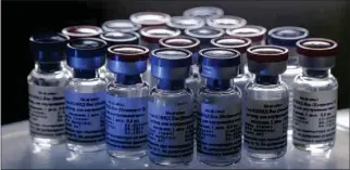  ?? RDIF/EPA-EFE ?? Vials of the Sputnik V vaccine are seen at Nikolai Gamaleya National Center of Epidemiolo­gy and Microbiolo­gy in Moscow, Russia.