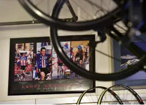  ?? Photos by Helen H. Richardson, The Denver Post ?? Framed photos of bike racing are on the walls at Peak Cycles.