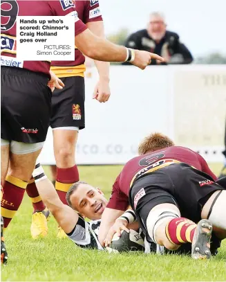  ?? PICTURES: Simon Cooper ?? Hands up who’s scored: Chinnor's Craig Holland goes over