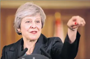  ?? AP PHOTO ?? Britain’s Prime Minister Theresa May takes questions during a press conference inside 10 Downing Street in London Thursday.