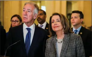  ?? AP/LIAM McBURNEY ?? House Speaker Nancy Pelosi, with House Ways and Means Committee Chairman Richard Neal, appears Friday at a news conference in Belfast, Northern Island. Pelosi said she would hold a conference call Monday with all House Democrats to discuss what she called “a grave matter” arising from the special counsel report.