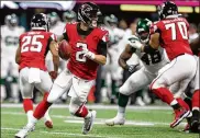  ?? CHRISTINA MATACOTTA / CHRISTINA.MATACOTTA@AJC.COM ?? Falcons QB Matt Ryan was sacked three times Thursday and hit at least half a dozen more on four possession­s vs. the Jets.