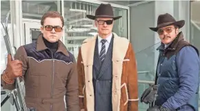  ?? GILES KEYTE/TWENTIETH CENTURY FOX ?? Taron Egerton, Colin Firth and Pedro Pascal battle a new villan in “Kingsman:” The Golden Circle."