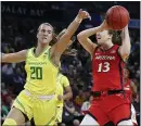  ?? JOHN LOCHER — THE ASSOCIATED PRESS ?? Oregon’s Sabrina Ionescu, left, defends Arizona’s Helena Pueyo during Saturday’s semifinal at the Pac-12tourname­nt.
