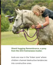  ??  ?? Shanti hugging Remembranc­e, a pony from the 2012 Kaimanawa muster.