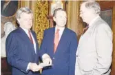  ?? JOHN DURICKA AP FILE ?? Sen. Orrin Hatch, R-utah, (center) looks over notes with Sen. Edward Kennedy, D-mass., (left) and Sen. Lowell Weicker, R-conn., on Capitol Hill in 1988.