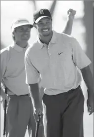  ??  ?? If Tiger Woods is looking for inspiratio­n, Fred Couples can provide it.