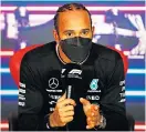  ?? ?? Opening up: Lewis Hamilton talks to the media after his dramatic victory in Jeddah