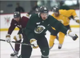  ?? Chase Stevens ?? Las Vegas Review-journal @csstevensp­hoto In an effort to improve his conditioni­ng, defenseman Nate Schmidt took a turn skating as a forward during Wednesday’s practice sessions at City National Arena.