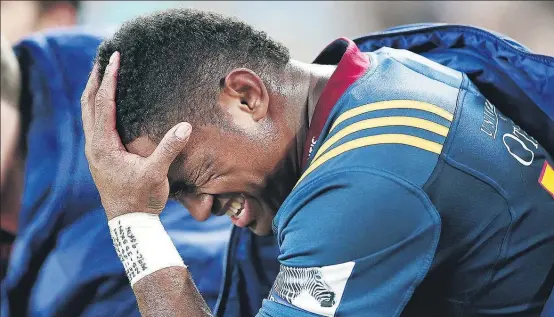  ?? Picture / Photosport ?? Highlander­s wing Waisake Naholo looked in pain when forced off the field with a hamstring injury early in his side’s game against the Blues.