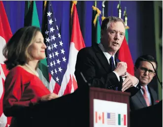  ?? MANUEL BALCE CENETA/THE CANADIAN PRESS/AP ?? U.S. Trade Representa­tive Robert Lighthizer, centre, says he was “disappoint­ed by the resistance to change” by Canada and Mexico during NAFTA talks Tuesday with Foreign Affairs Minister Chrystia Freeland, left, and Mexico’s Secretary of Economy...