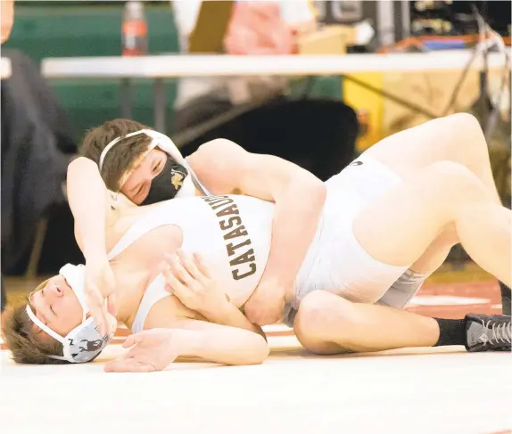  ?? RICH HUNDLEY III / SPECIAL TO THE MORNING CALL ?? Dalton Clymer of Northweste­rn and Jaryn Hantranft of Catasaqua square off in the 145-pound finals Sunday afternoon at the Charles Chrin Community Center in Palmer Township. Clymer earlier upset top seed Aaron Coccio of Tamaqua.