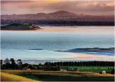  ??  ?? A finger of lava sticks into Lake Corangamit­e, near Colac. This vast, 209sq.km lake is three times saltier than the ocean.